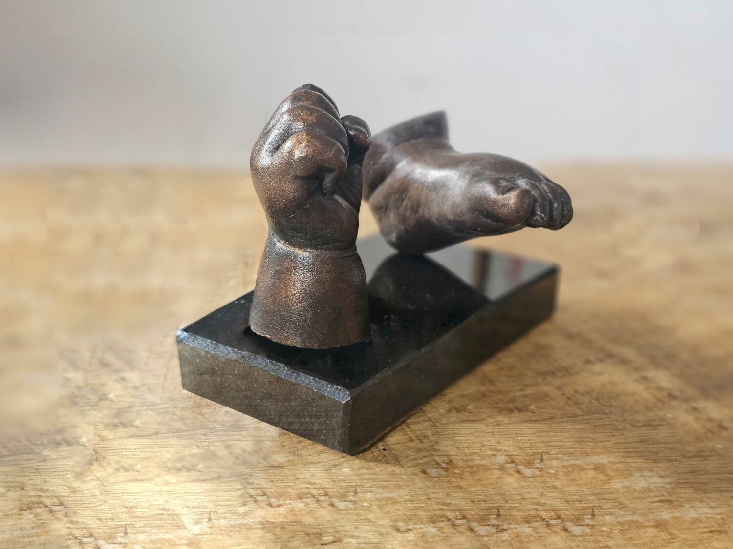 handje en voetje in brons baby