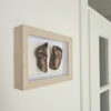 3D schilderij met hand en voetafdruk
