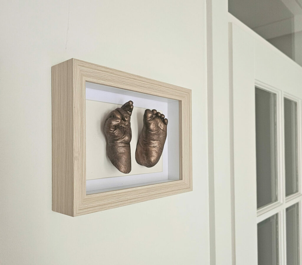 3D schilderij met hand en voetafdruk