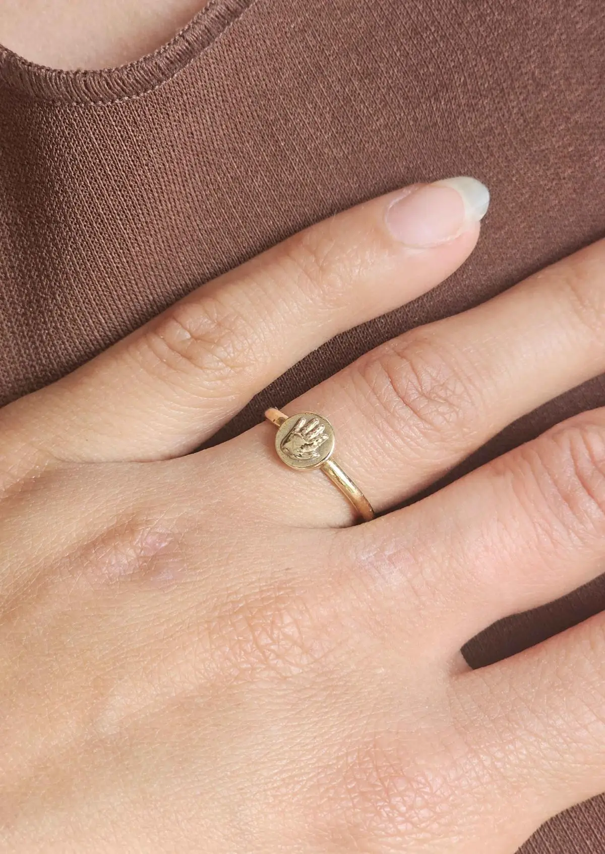 smalle ring met afdruk van kindje