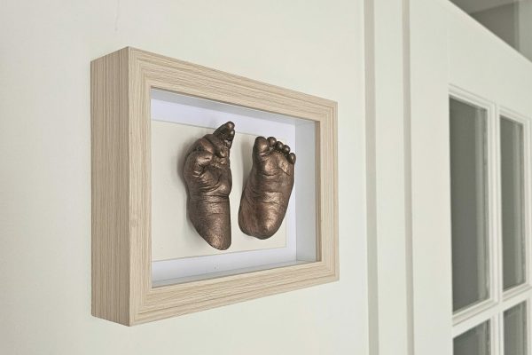 3D schilderij met hand en voetafdruk